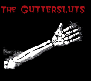 Black background, with The Guttersluts band name in red, drippy writing, and a white skeleton hand going across the chest grabbing at a boob. 